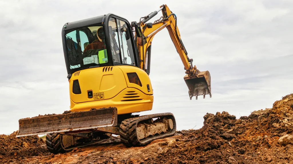 Descubra por que as máquinas compactas dominam as obras urbanas: versatilidade, economia, sustentabilidade e aluguel flexível na construção civil.